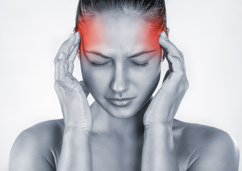 woman with headache isolated on white background